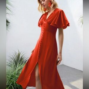 Luxe orange button detail ruffle sleeve dress